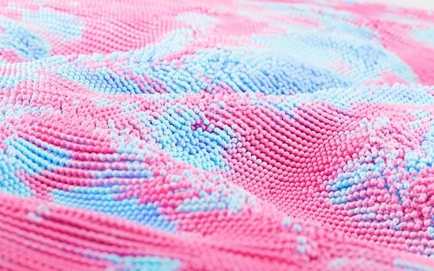 Zbliżenie haftu z pastelowymi niciami